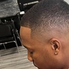 Image 4: Refined haircuts and traditional grooming services