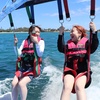 Image 4: Soar to New Heights with Tandem Parasailing Adventure!