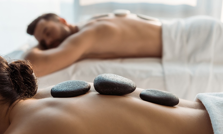 Image 2: 60-Min Foot Reflexology & Body Session w/ Foot Bath & Hot Stones