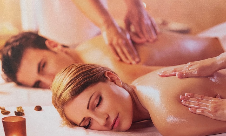 Image 2: Couples Massage Near the Beach Under Expert Therapists in Naples, FL