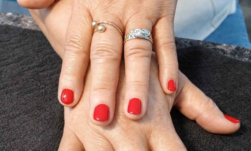 Image 3: One or Three OPI Manicure and Pedicure Packages