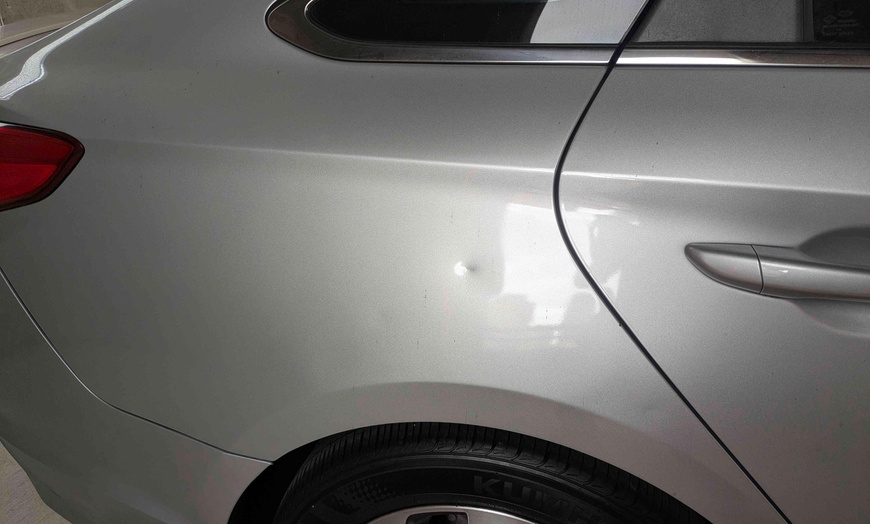 Image 3: Paintless Dent Repair Credit for Vehicle Dent Restoration