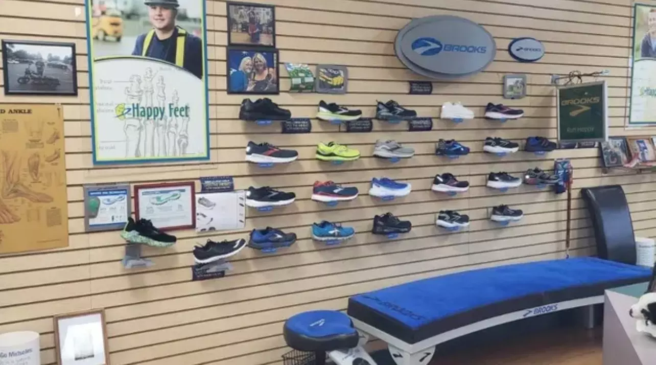 $20 off Brooks Shoe Purchase or $50 Towards Custom Orthotic Inserts at Happy Feet (Up to 75% Off) - Second Medium