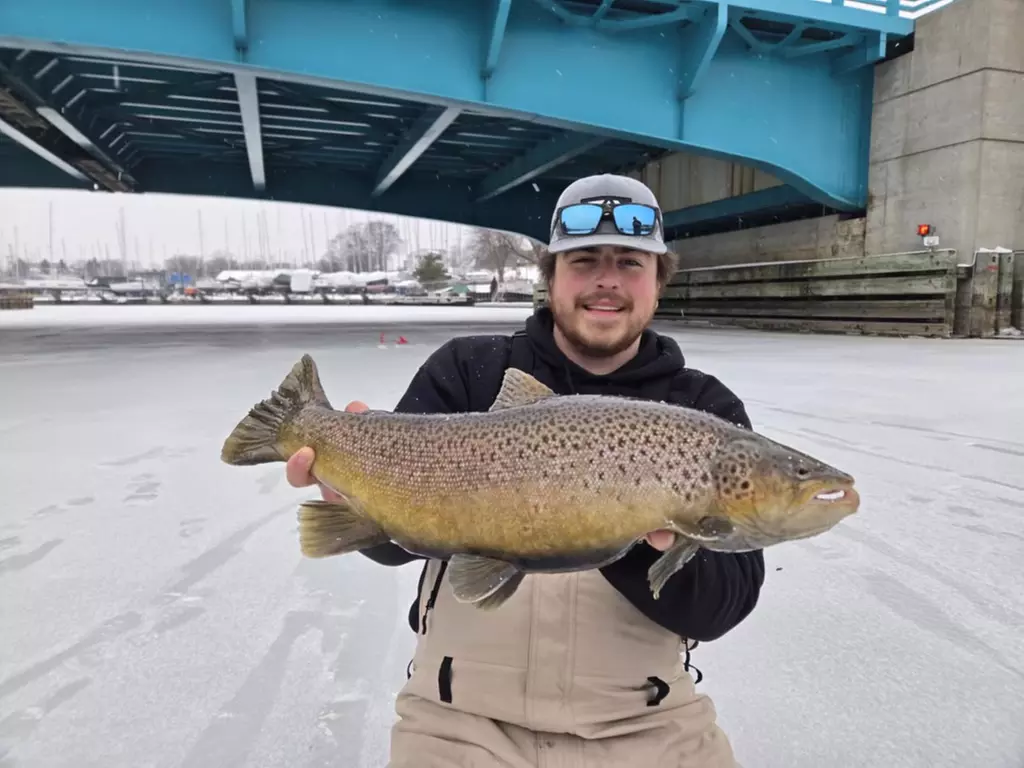 Experience Unforgettable Guided Ice Fishing for Trout & Salmon in Wisconsin - Second Medium