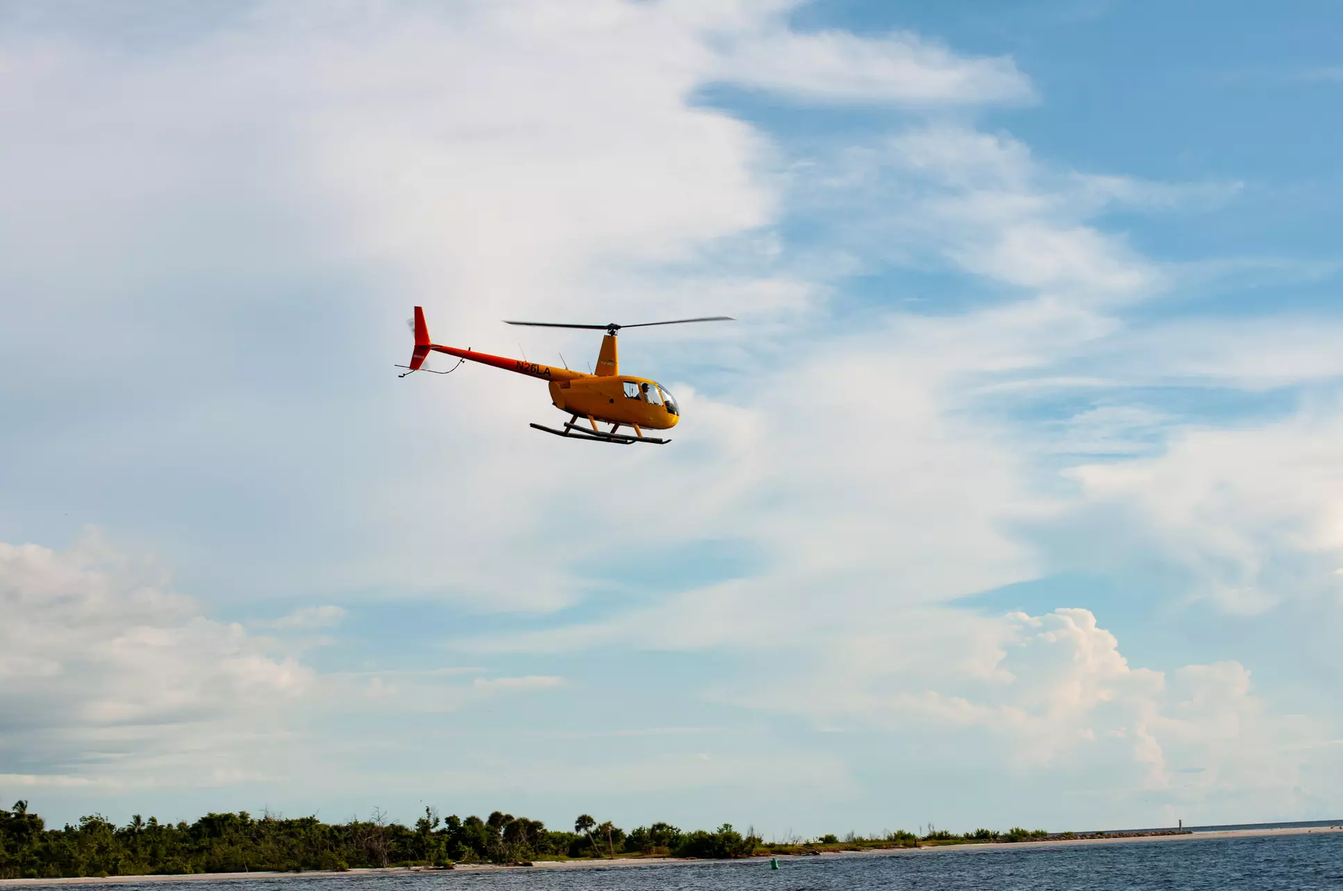 Soar Above Fort Myers Beach: Experience the Unique Boat-to-Heli Coastal Flight!