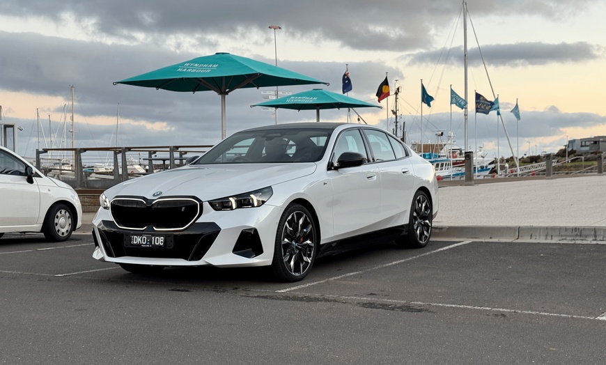 Image 2: Experience Luxury Transfers with Chauffeur/Meet & Greet in 2025 BMW i5