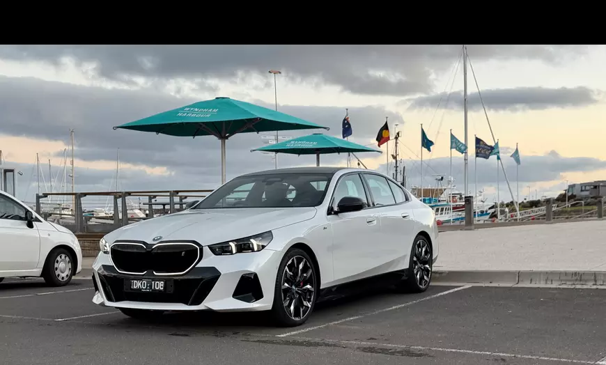 Image 2: Experience Luxury Transfers with Chauffeur/Meet & Greet in 2025 BMW i5