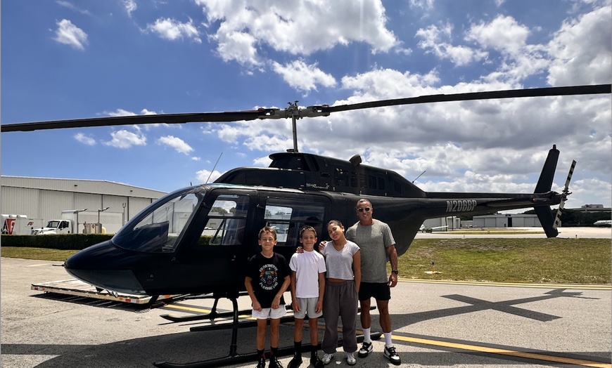 Image 2: Helicopter Tour Over Beaches and Cityscapes