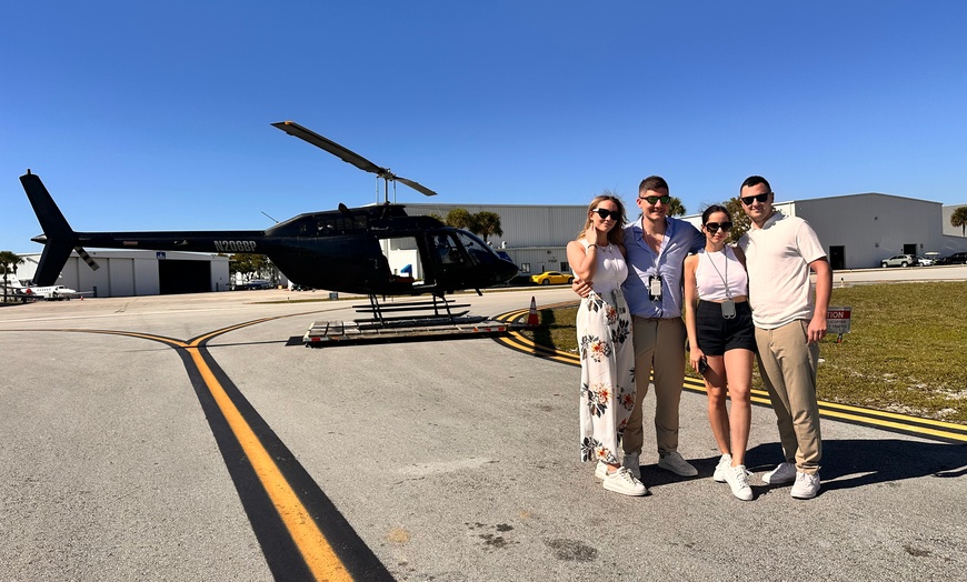 Image 3: Helicopter Tour Over Beaches and Cityscapes