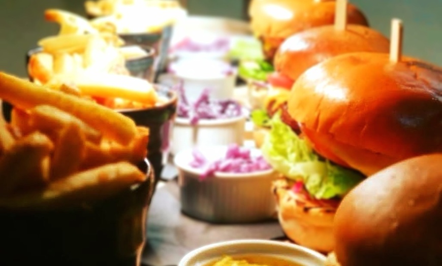 Image 1: Choice of any Burger with Fries and Beer for One, Two, or Four