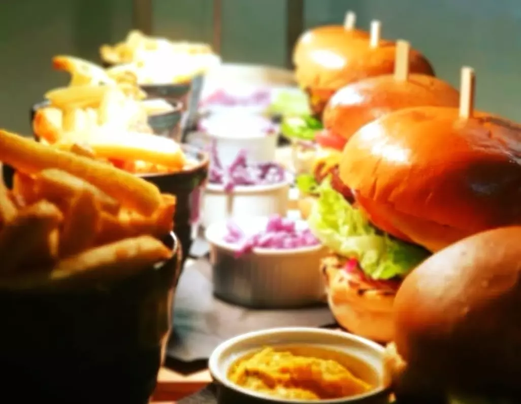 Choice of any Burger with Fries and Beer for One, Two, or Four