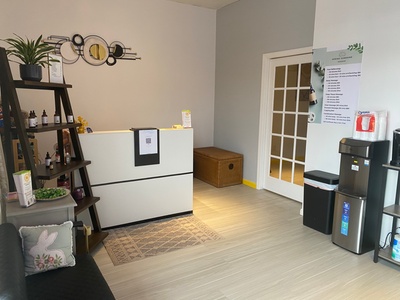 60 Minute Swedish or Deep Tissue Massage with Hot Towels and Optional Hot Stones - Spring Sunshine Massage