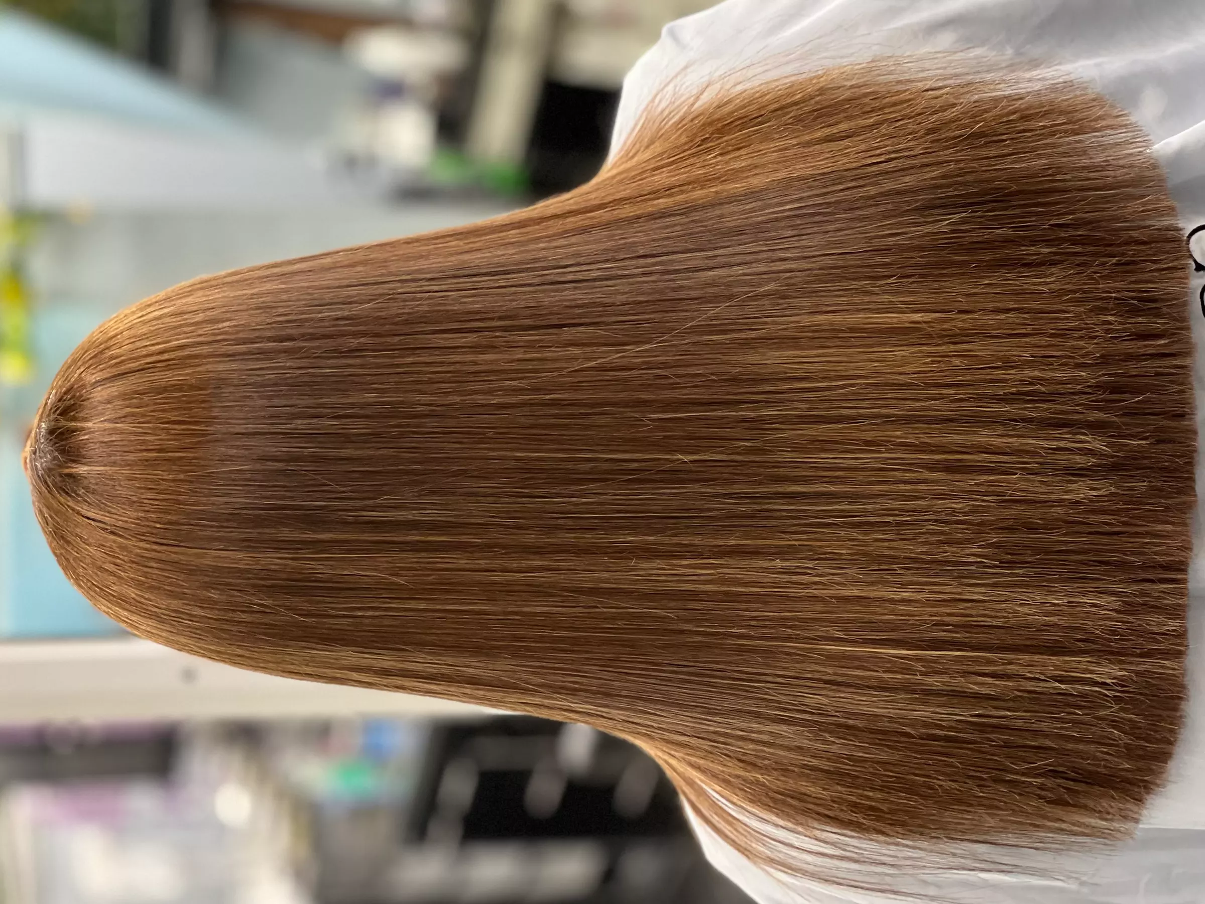 Experience Planet Color Salon's Brazilian Blowout and Haircut options with up to 45% off for silky, smooth hair