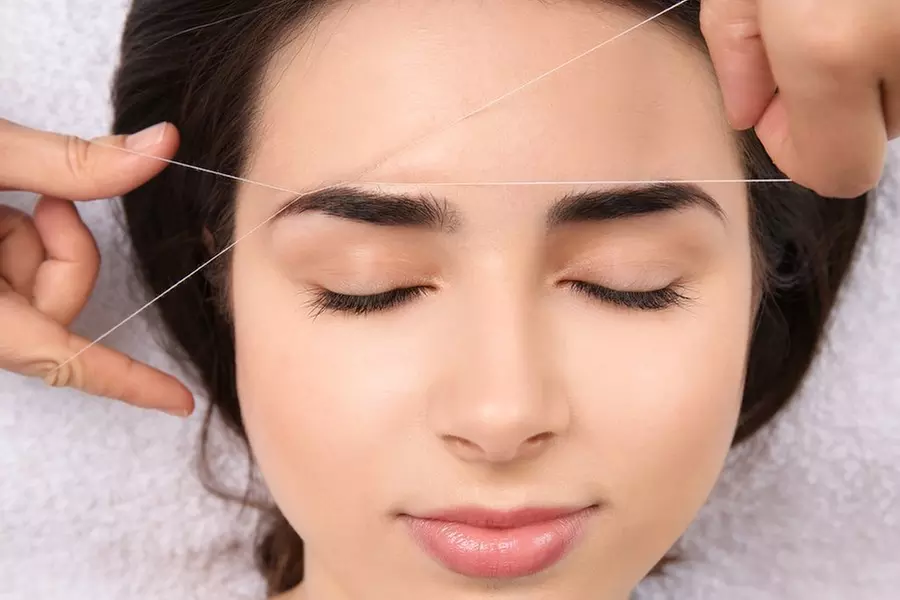 Discover Mero Brow and Lash Bar's eyebrow threading options for a polished look, offering up to 30% off. - Primary Image