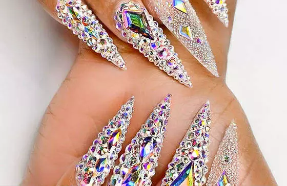 Enjoy a Gel Manicure or Mani-Pedi with Nail Art Design
