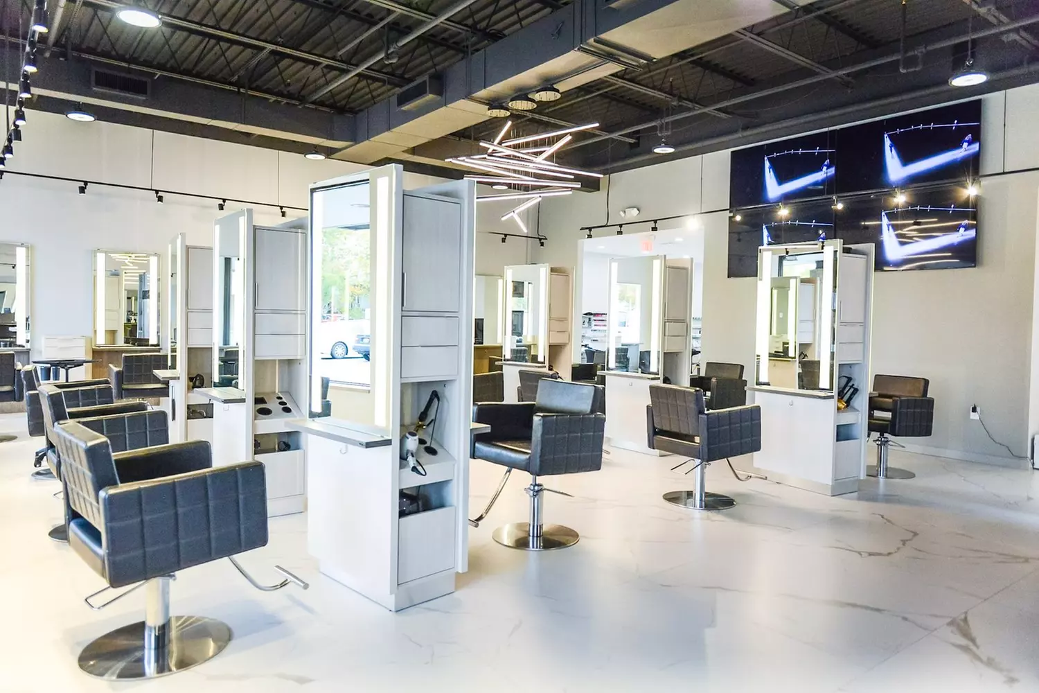 Women's and Teen Haircuts with Blowout and Conditioning Options