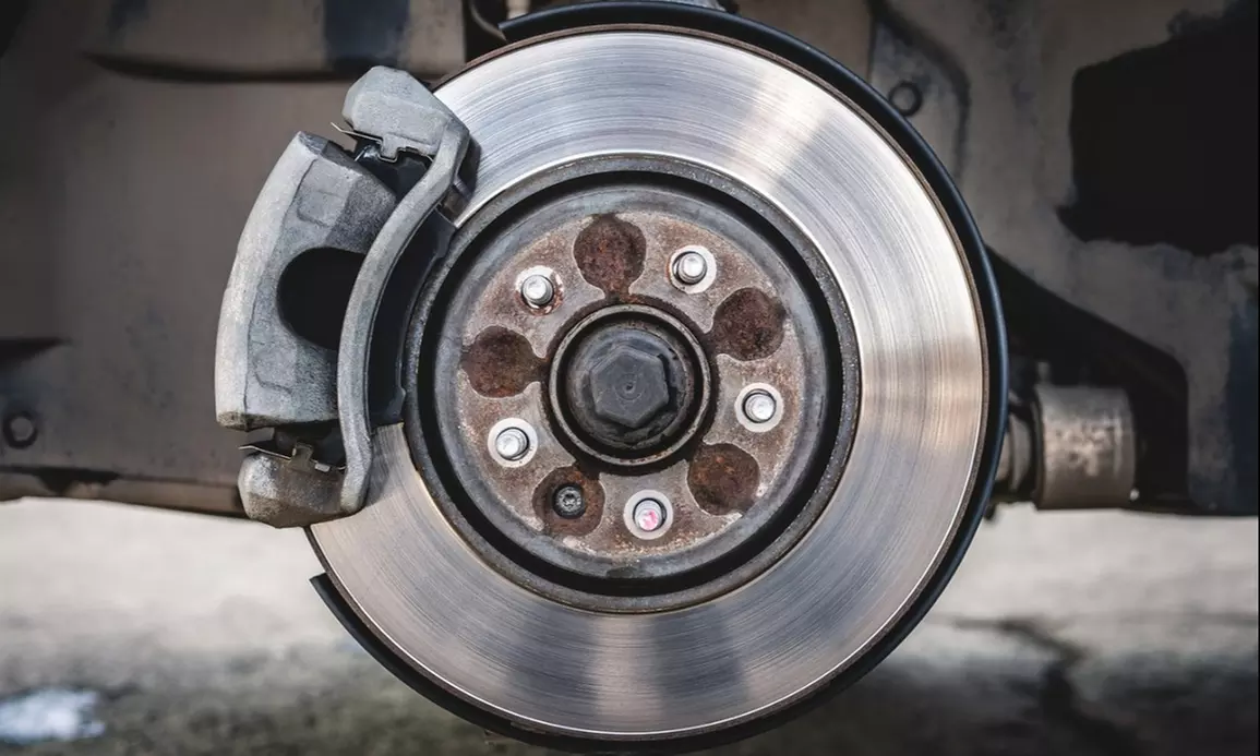Transform your car with Johnson's Auto Repair's Front and Rear Brake Pad Replacement, offering up to 41% off. - Primary Image