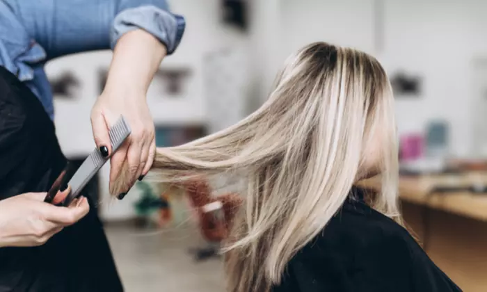 Haircut or Root Touch-Up with Deep Conditioning Treatment and Blow Dry or Partial Highlights ( Up to 55% Off ) - Primary Image