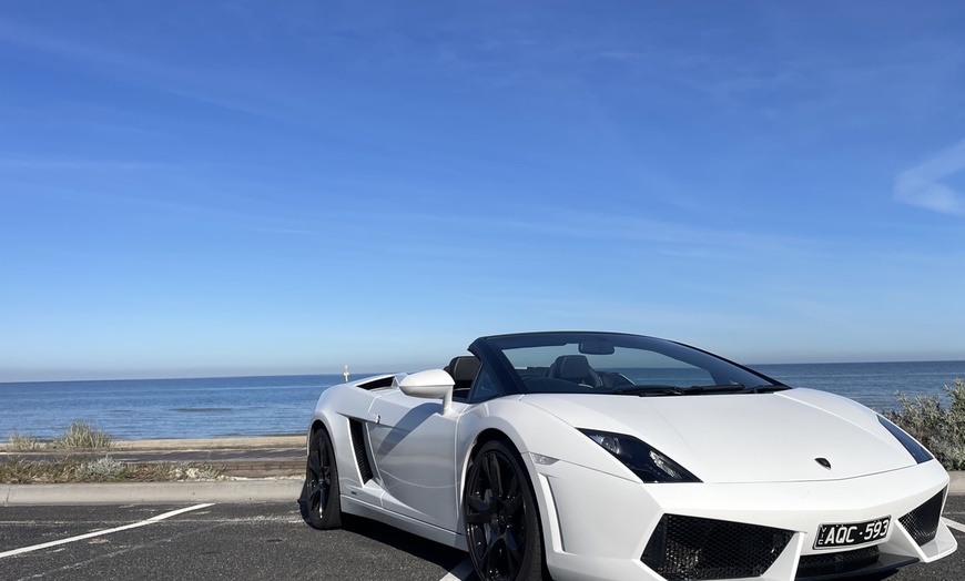 Image 1: Feel the Thrill with a 30-minute Lamborghini Drive or Ride!