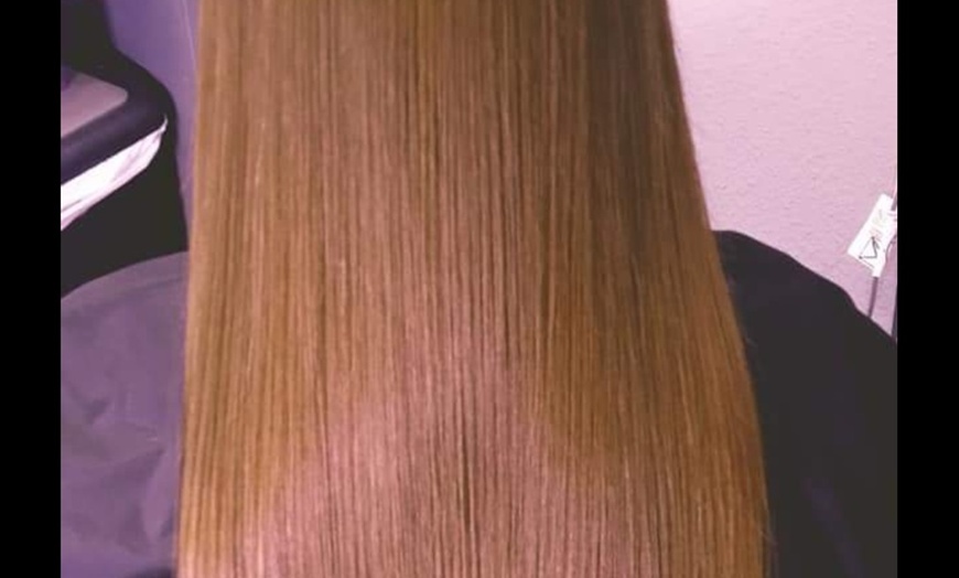 Image 1: Smooth and Sleek With a Brazilian Blowout Smoothing Treatment