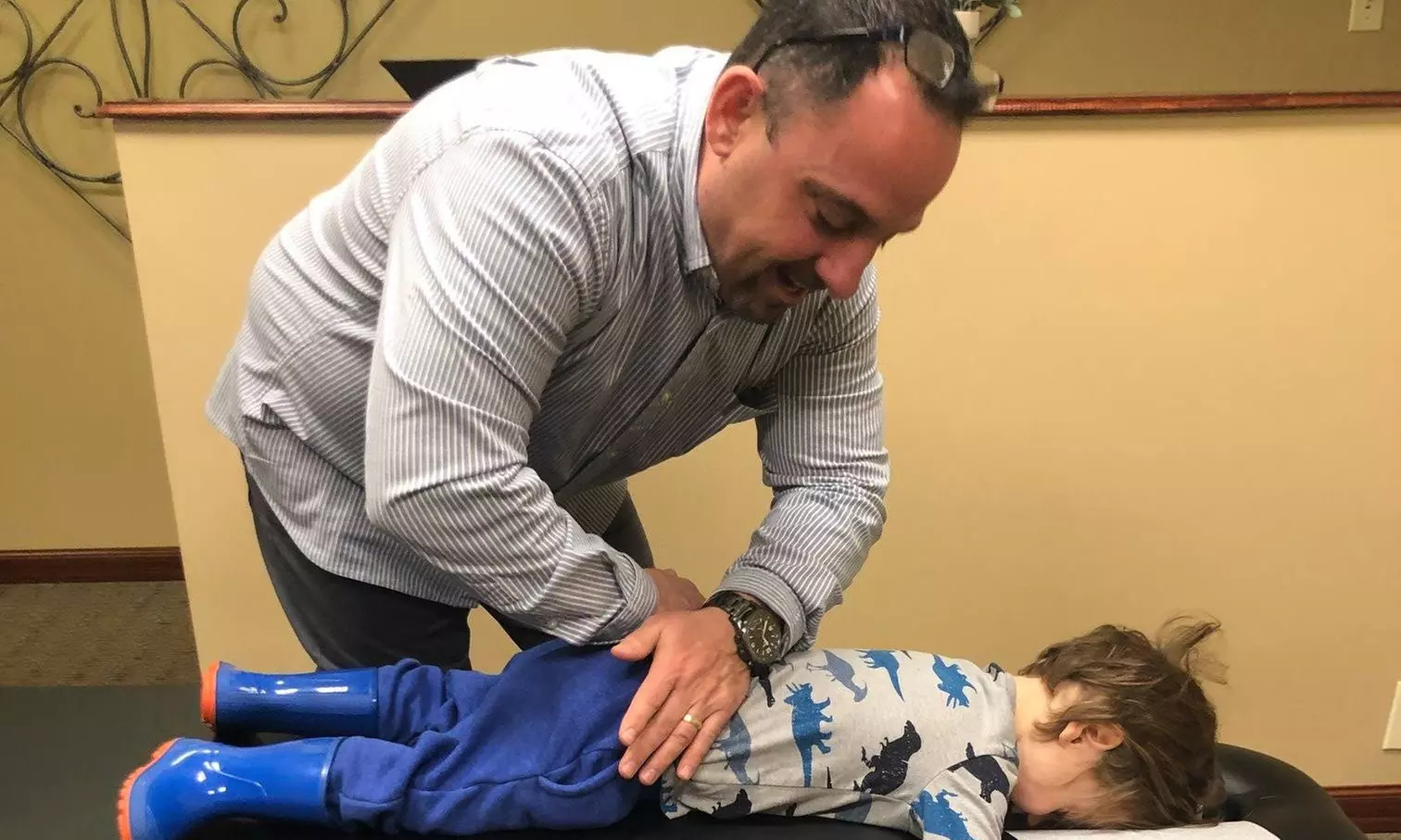 Chiropractic exam, adjustments and therapy sessions for pain relief