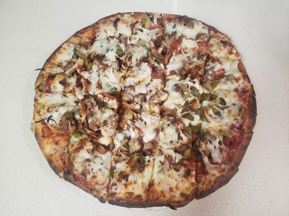 Up to 39% Off on Italian Cuisine at Pinellas Pizzeria - Primary Image