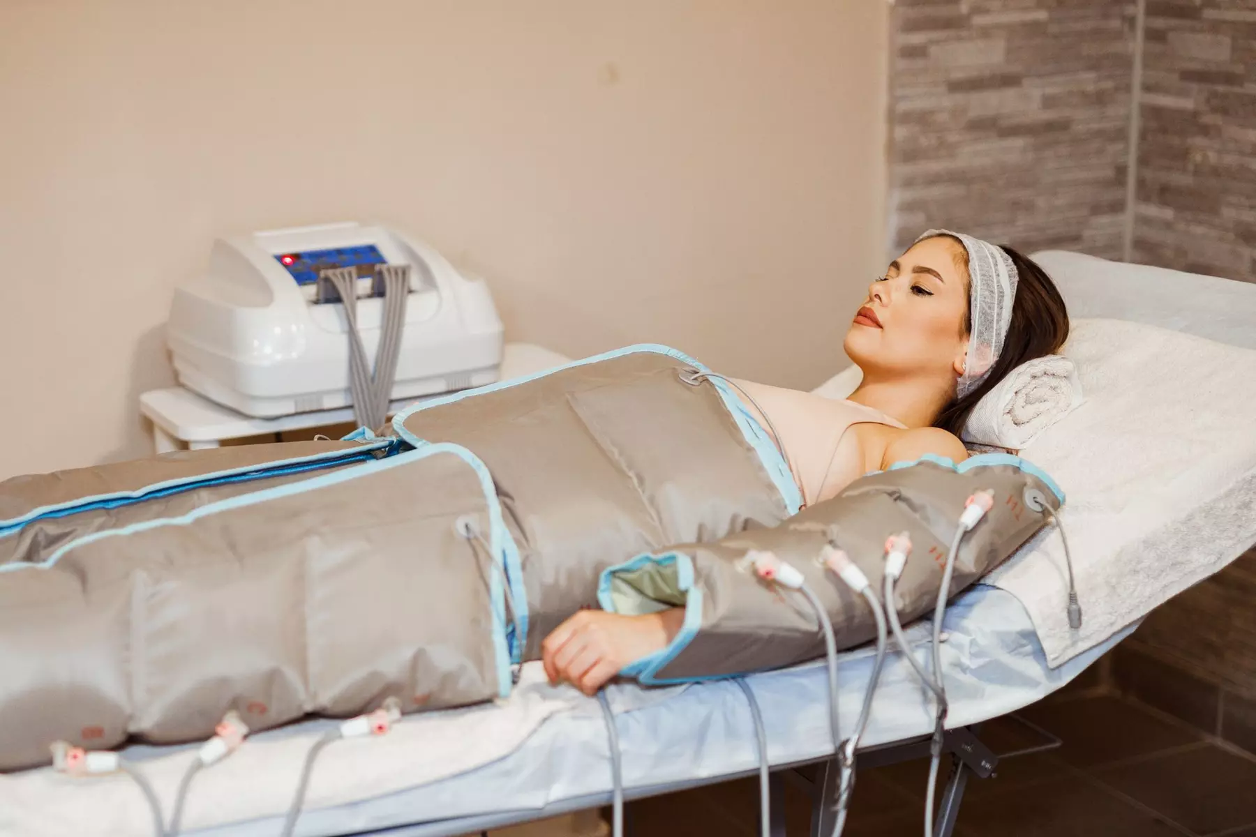 Experience Lavish MedSpa's revitalizing full-body pressotherapy sessions, offering up to 50% off. - Primary Image