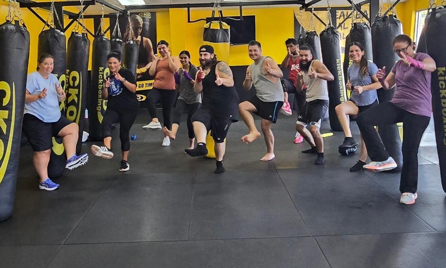 Image 1: CKO Kickboxing Texas - 3 Classes or One Month of Kickboxing Unlimited