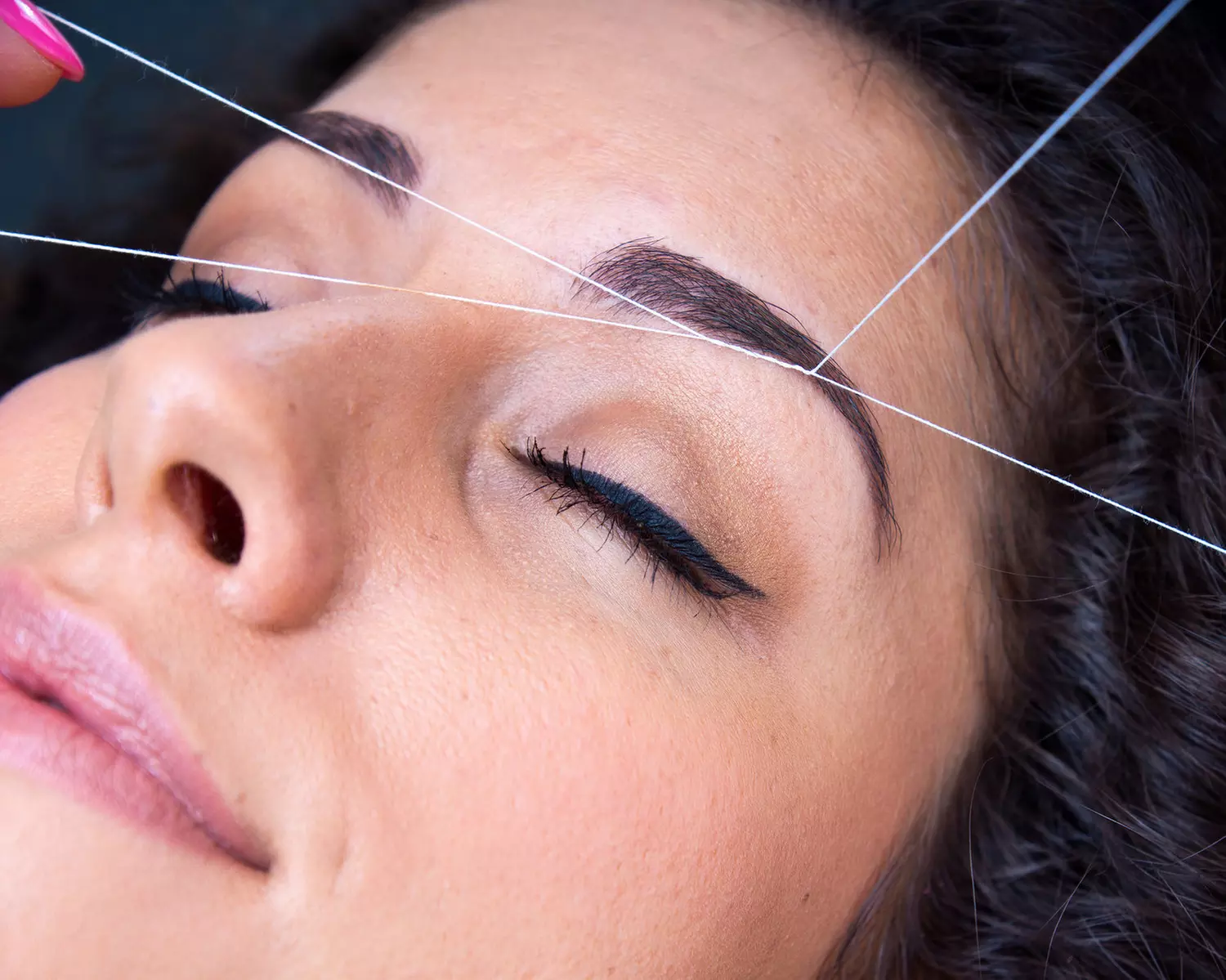 Experience Devi's Threading eyebrow services with options for single or multiple sessions, offering up to 48% off. - Primary Image