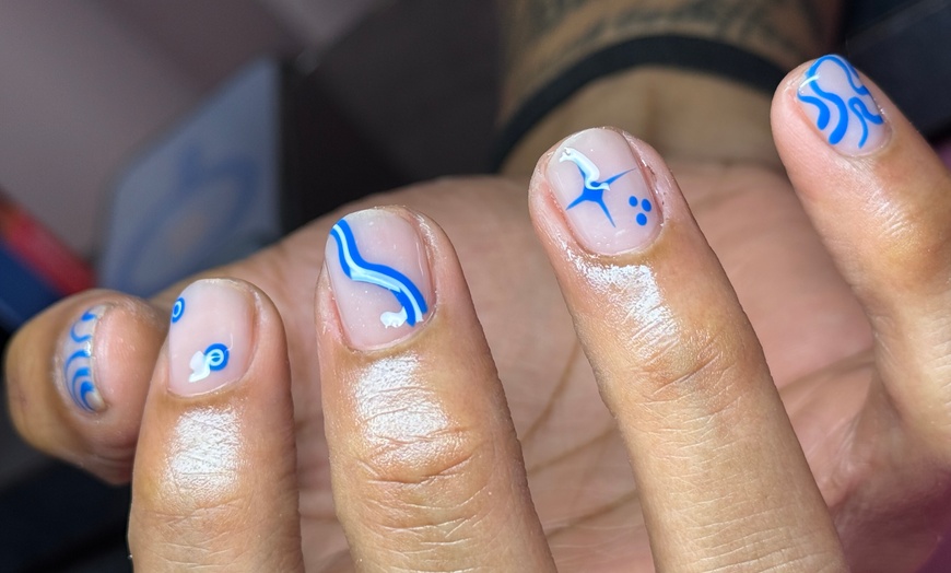 Image 1: Ultimate Nail Care: Gel Mani and Pedi Combo