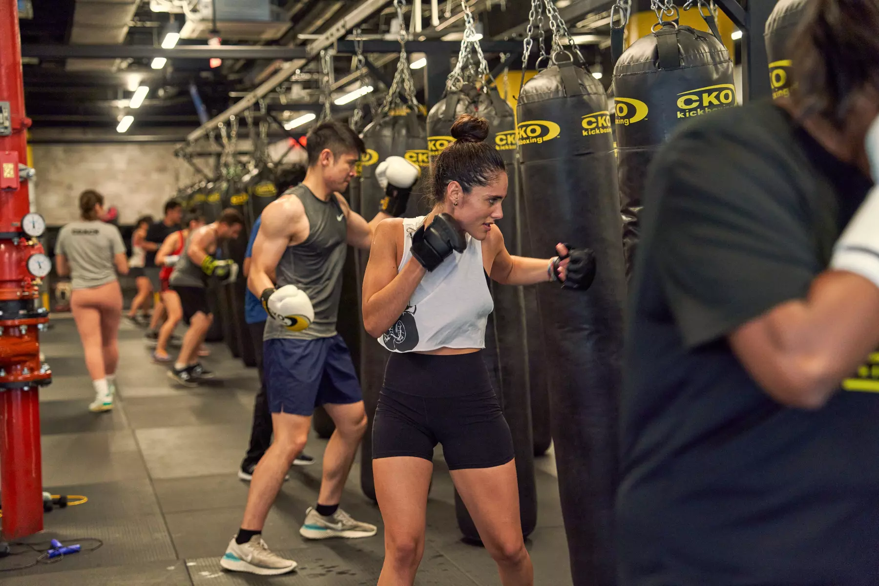 Experience unlimited CKO Kickboxing - Jersey City classes with premium gloves included, up to 49% off, for a full-body workout