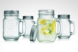 Set de 4 mason jars de vidrio con asa y tapa por $299