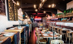 Pizza a la leña + refrescos para dos con 55% off
