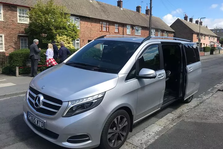 2-Hour Beatles "Carpool Karaoke" includes a drink in the "Phil"