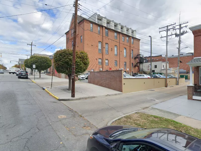 Parking at Alley Entrance - 911 W. 36th St. Lot - Primary Image