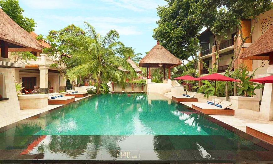 Image 1: ✈ BALI | Sanur - Griya Santrian a Beach Resort 4* - Outdoor swimmin...