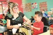 $13.50 For Any Single Boy's or Girl's Haircut (Reg. $27.95) - Second Medium
