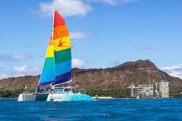 Board from Waikiki Beach for a scenic Sunset Sail on the Hāwea