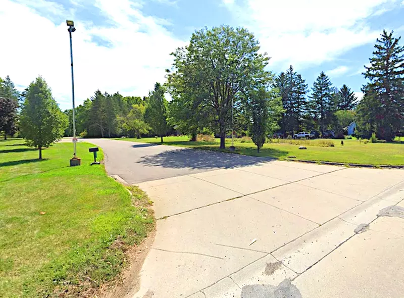 Parking at 2560 Eaton Rapids Rd. Lot