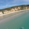 Image 1: Rainbow Beach: Stand Up Paddle Board 4x4 Tour Double Island Point