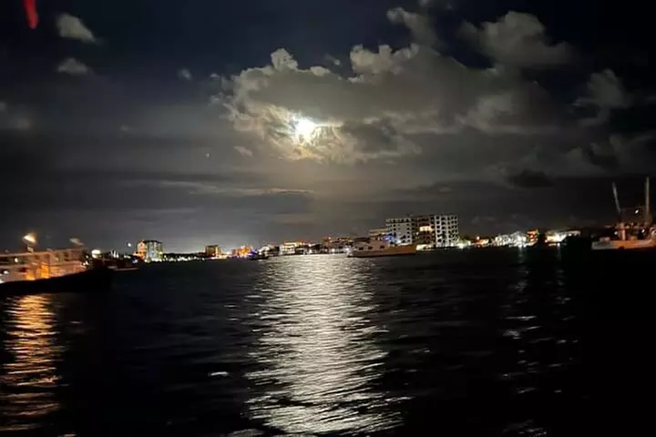 Original Destin Tikis Harbor Lights Cruise through Destin Harbor