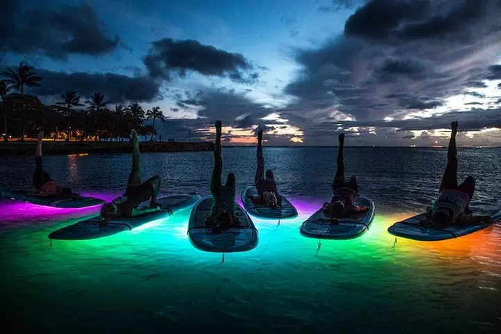 Night SUP Yoga in Honolulu, Hawaii