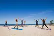 Beach Yoga with Silent Disco Headphones at Old Airport Beach - Second Medium