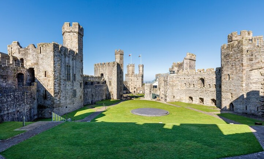 Image 1: North Wales and Caernarfon Castle from Manchester