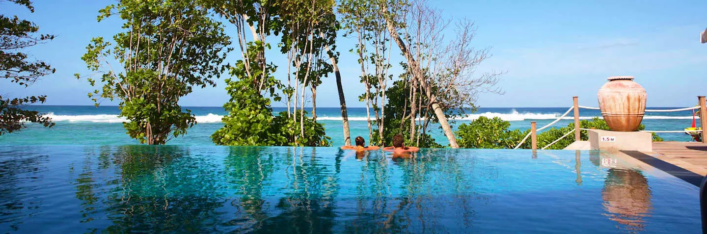 ✈ SEYCHELLEN | Insel Mahé - DoubleTree by Hilton Seychelles Allamanda Resort & Spa 4*, 5 Nächte - Infinity-Pool - Primary Image