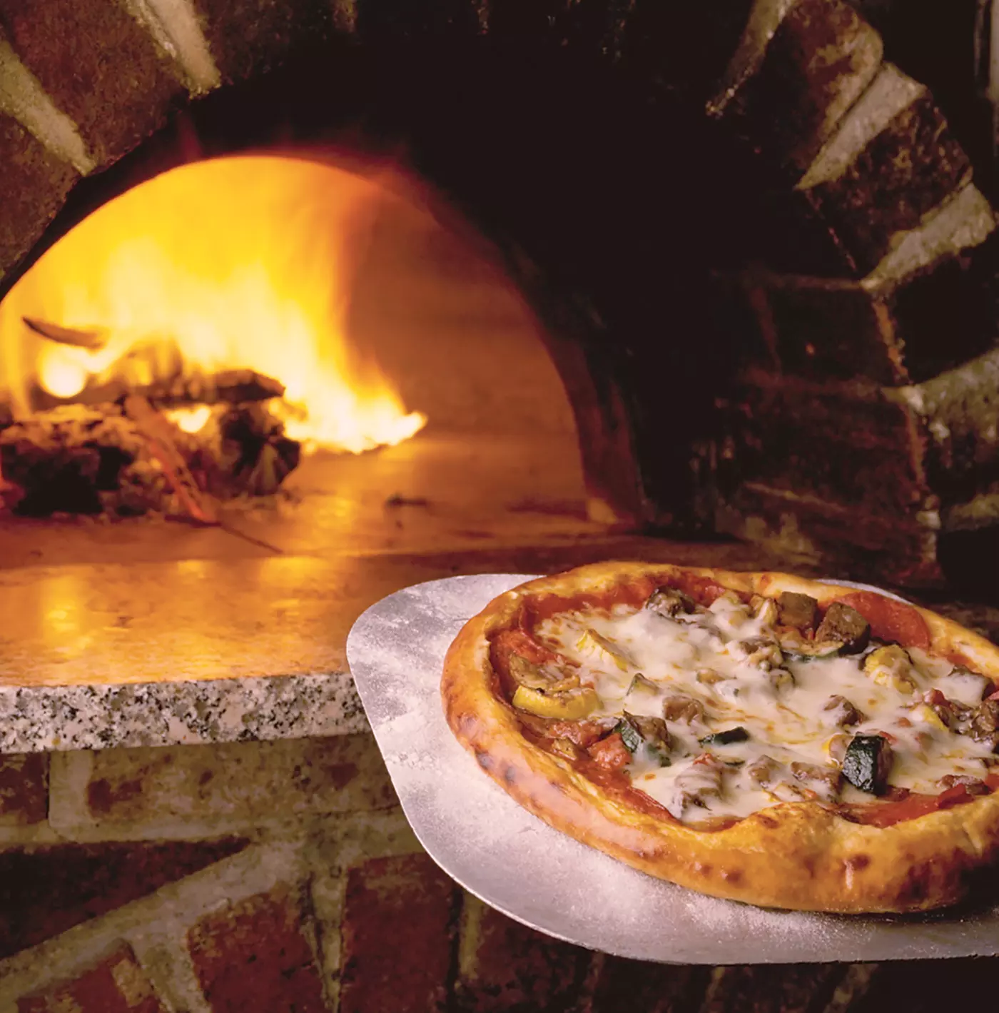 $10 For $20 Worth Of Pizza, Subs & More (Also Valid On Take-Out W/Min. Purchase $30) - Primary Image