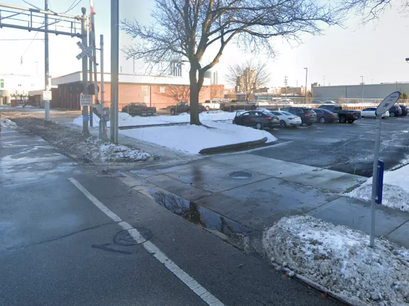 Parking at 528 Bridge St. NW. Lot