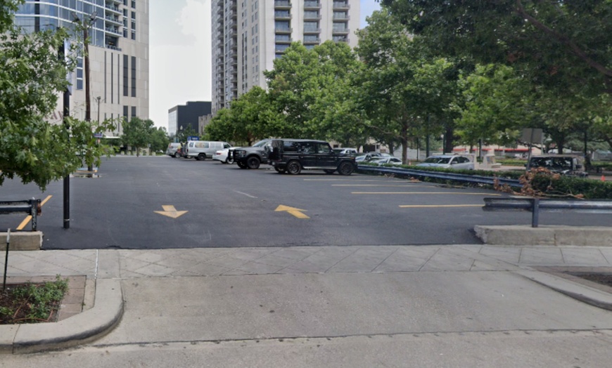 Image 3: Parking at 402 Travis St. Lot