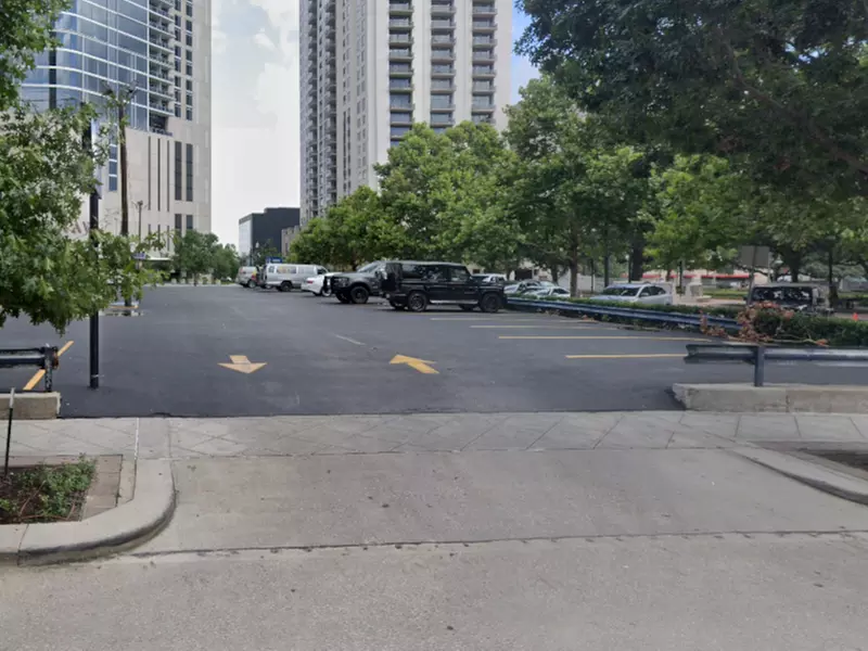 Parking at 402 Travis St. Lot