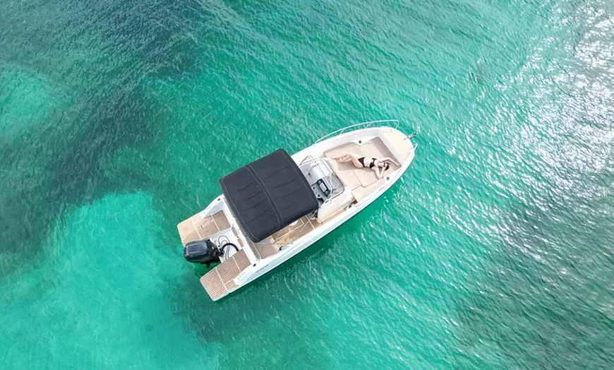 Image 2: Tour Privado en Barco por San Antonio con Paddel surf y Snorkel